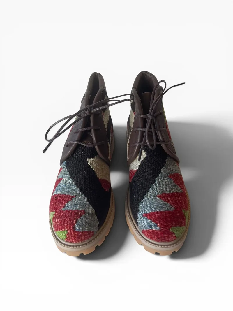 Kars lace-up boot in a crimson and slate-blue zigzag kilim with a black band over the vamp