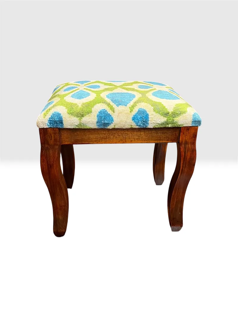 Kilim stool with a turquoise garden-lattice top on an oiled walnut cabriole frame